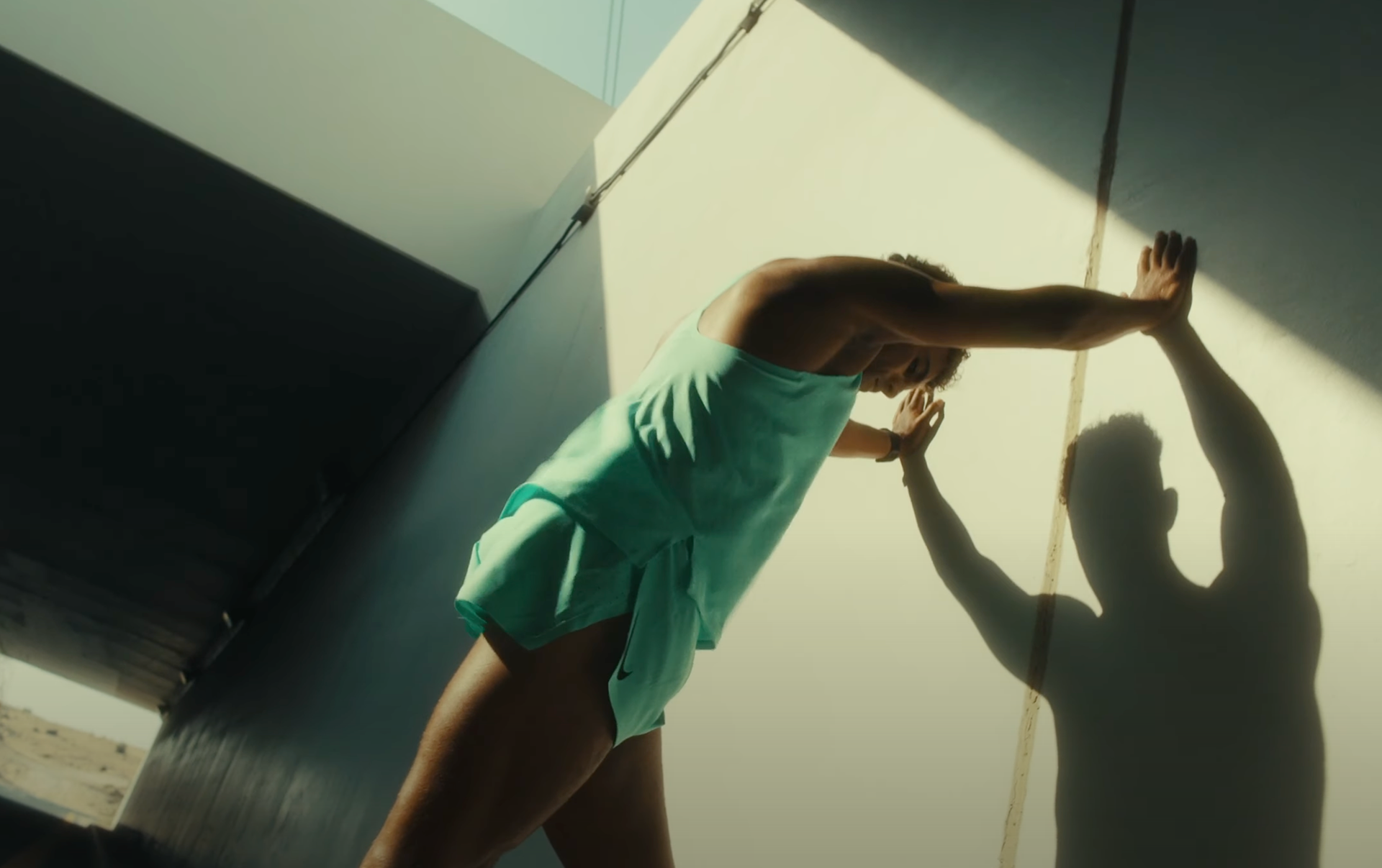 Athlete in motion, lit by directional natural light